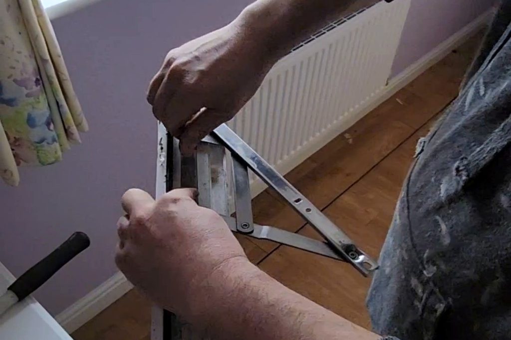 gas-pipeline Replacement window hinge fitted to a uPVC window